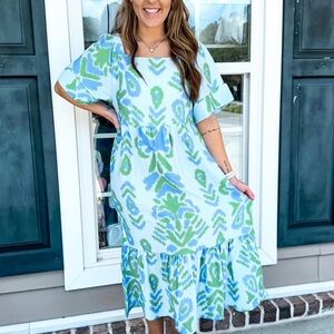 Michelle Mcdowell’s very own Daphne Midi Dress in the pattern Summer Sunday Blue